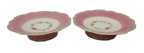 PAIR OF HAND PAINTED PEDESTAL BOWLS - BOTH HAVE CHIP UNDER RIM