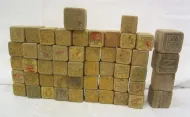 VERY OLD WOOD BLOCKS, FADING FROM AGE AND PLAY
