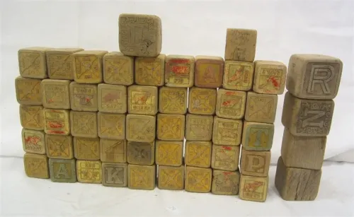 VERY OLD WOOD BLOCKS, FADING FROM AGE AND PLAY