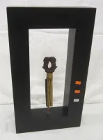 DECORATIVE BATAK BAMBOO CALENDAR WITH TWO FIGURES ON DECORATIVE STAND