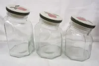 SET OF THREE GRADUATED GLASS JARS WITH CERAMIC LIDS
