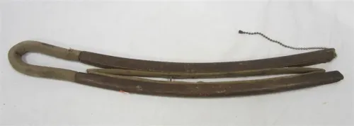 WHAT IS IT? SPRING ON END, CURVED WOOD PINCHES TOGETHER