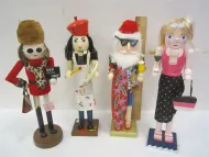 FOUR HOLIDAY CHEER WOODEN NUTCRACKERS
