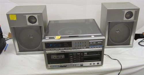 VINTAGE JC PENNEY SELF STEREO AND SPEAKERS.  WORKS WILL NEED CONTACTS CLEANED.  TURN TABLE, CASSETTE PLAYER, 8 TRACK PLAYER, SPEAKERS